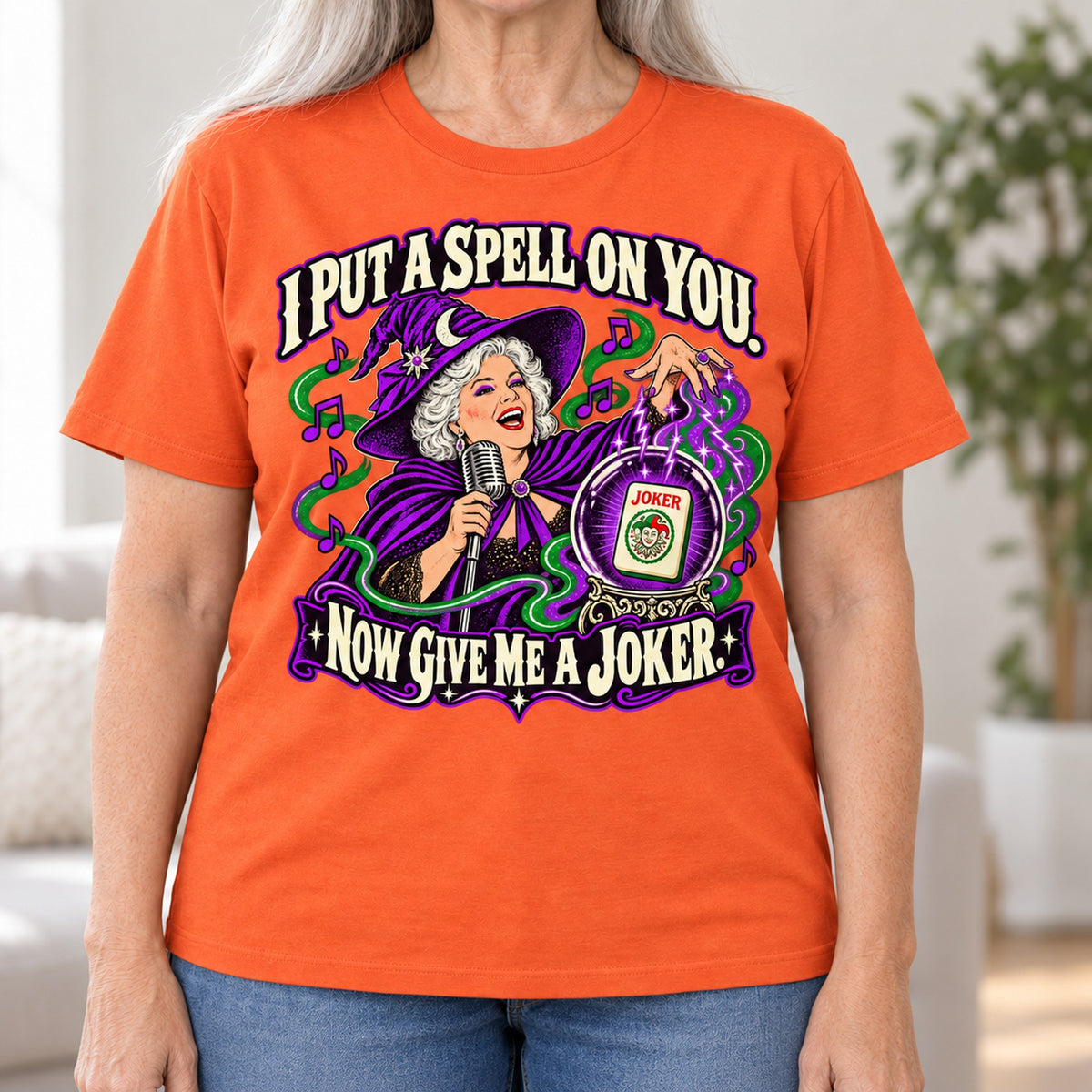I Put A Spell On You mahjong T-shirt in Orange, close-up of the print, worn by Marilyn. Marilyn is 5′5″ and wears her usual size L. [bb c=orange r=close]