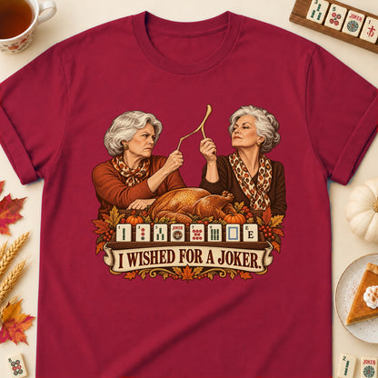 I Wished For A Joker mahjong T-shirt in Cardinal Red, laid flat. [bb c=cardinal-red r=flat]