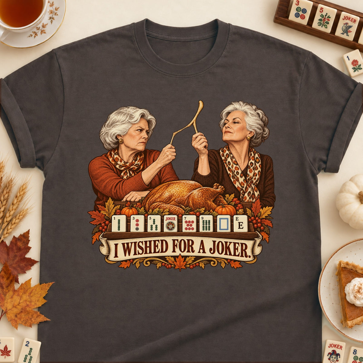 I Wished For A Joker mahjong T-shirt in Dark Chocolate, laid flat. [bb c=dark-chocolate r=flat]