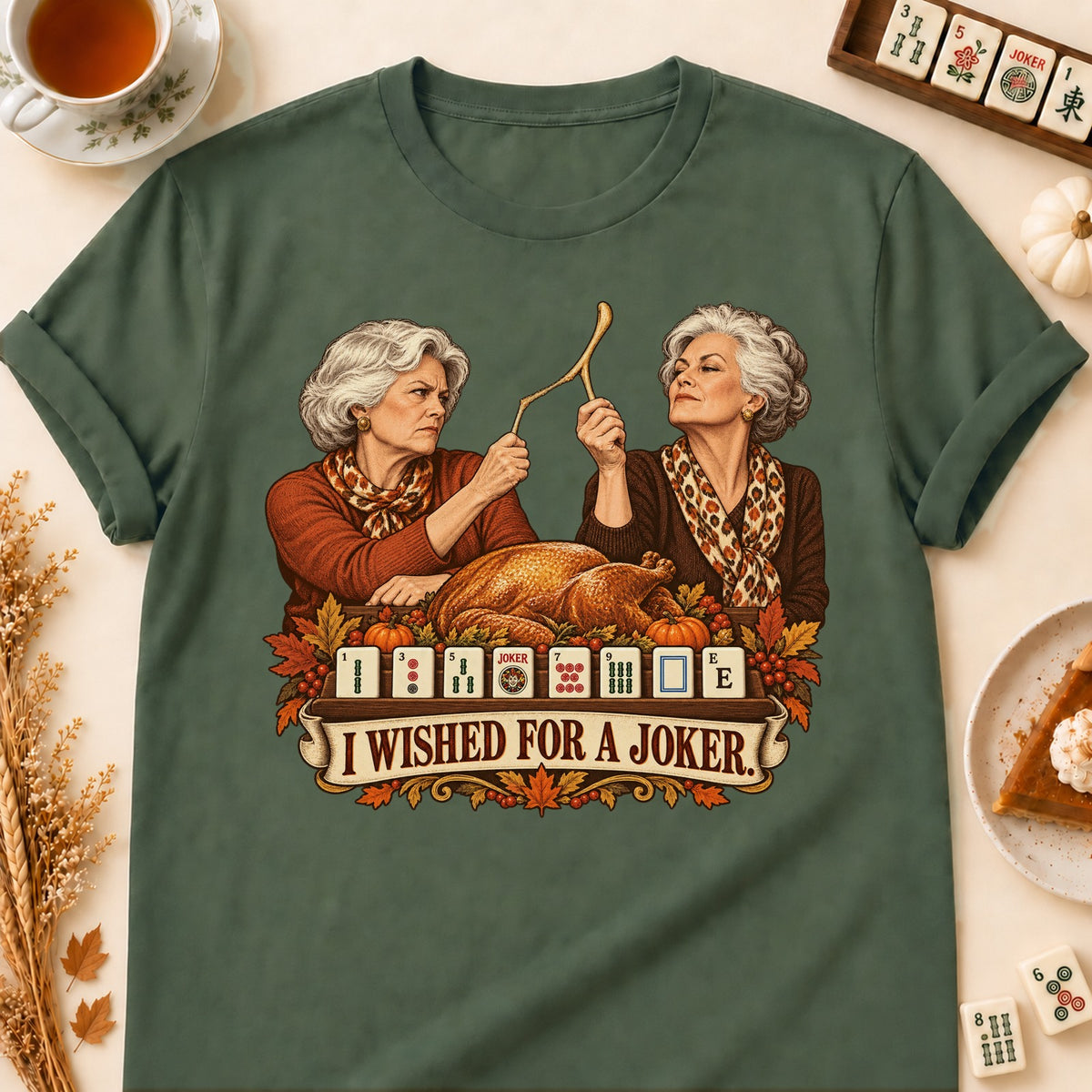 I Wished For A Joker mahjong T-shirt in Military Green, laid flat. [bb c=military-green r=flat]