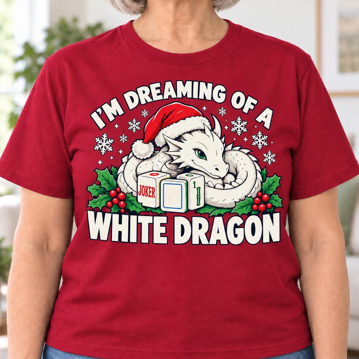 White Dragon mahjong T-shirt in Cardinal Red, close-up of the print, worn by Carol. Carol is 5′5″ and wears her usual size L. [bb c=cardinal-red r=close]