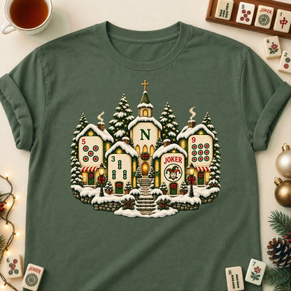 Christmas Village mahjong T-shirt in Military Green, laid flat. [bb c=military-green r=flat]