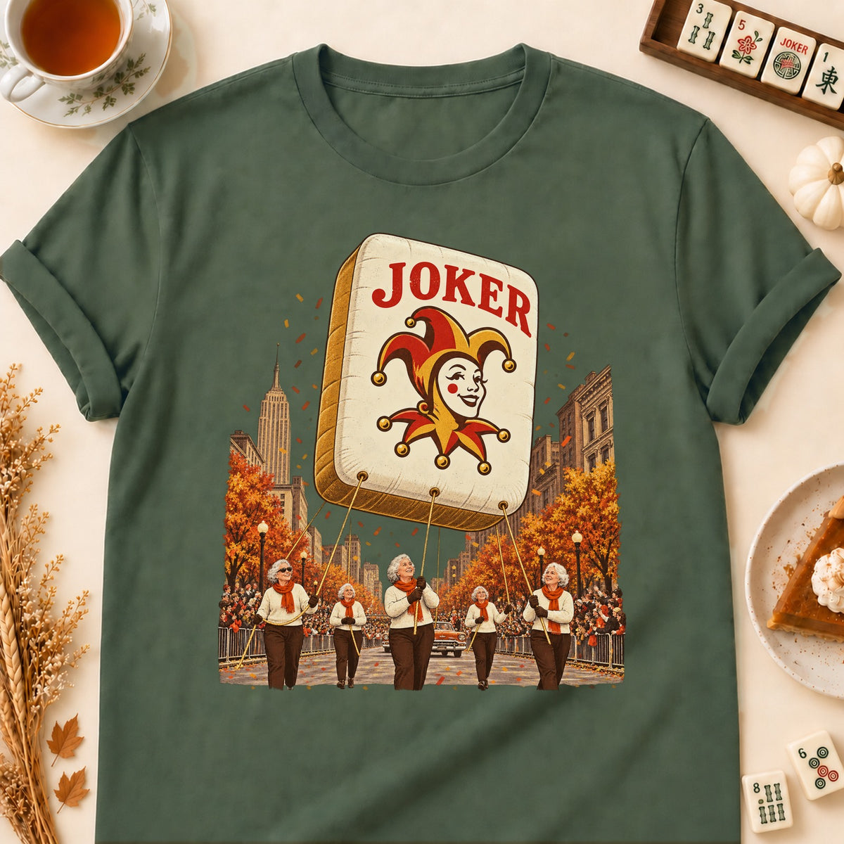 Mahjong parade balloon T-shirt in Military Green, laid flat. [bb c=military-green r=flat]