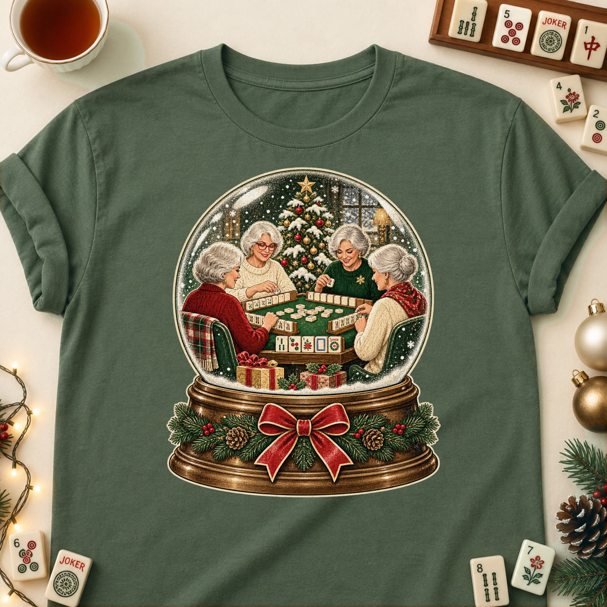 Mahjong snow globe T-shirt in Military Green, laid flat. [bb c=military-green r=flat]