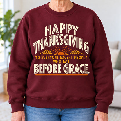 Happy Thanksgiving Before Grace sweatshirt in Maroon, close-up of the print, worn by Helen. Helen is 5′5″ and wears her usual size M. [bb c=maroon r=close]