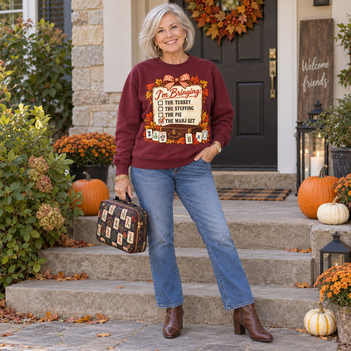 I'm Bringing The Mahj Set sweatshirt in Maroon, full length, worn by Elaine. Elaine is 5′5″ and wears her usual size M. [bb c=maroon r=fit]