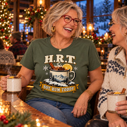 H.R.T. Hot Rum Toddy T-shirt in Military Green, worn by Sheila. Sheila is 5′5″ and wears her usual size 2XL. [bb c=military-green r=body2]
