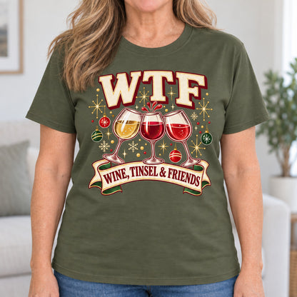 WTF Wine, Tinsel & Friends T-shirt in Military Green, close-up of the print, worn by Debbie. Debbie is 5′4″ and wears her usual size L. [bb c=military-green r=close]