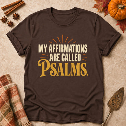My Affirmations Are Called Psalms faith T-shirt in Dark Chocolate, laid flat. [bb c=dark-chocolate r=flat]