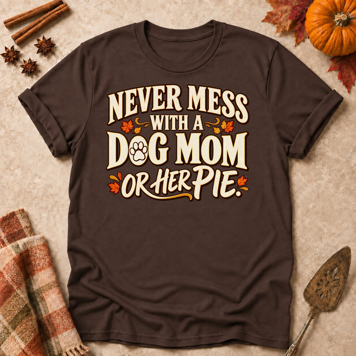 Never Mess With A Dog Mom T-shirt in Dark Chocolate, laid flat. [bb c=dark-chocolate r=flat]