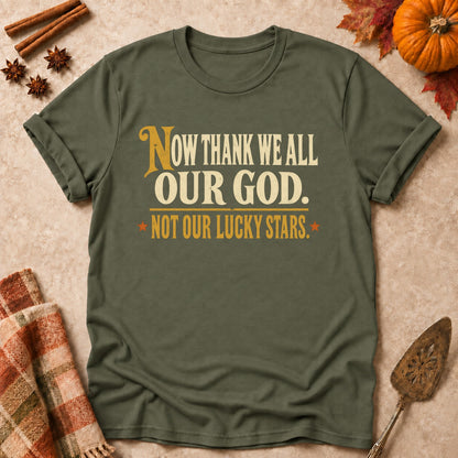 Not Our Lucky Stars faith T-shirt in Military Green, laid flat. [bb c=military-green r=flat]