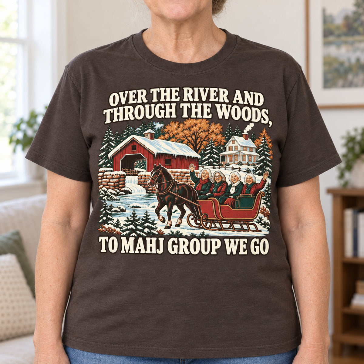 Over The River mahjong T-shirt in Dark Chocolate, close-up of the print, worn by Margaret. Margaret is 5′5″ and wears her usual size L. [bb c=dark-chocolate r=close]