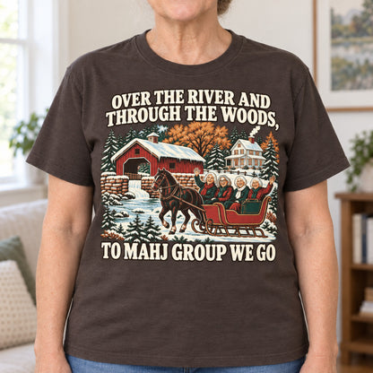Over The River mahjong T-shirt in Dark Chocolate, close-up of the print, worn by Margaret. Margaret is 5′5″ and wears her usual size L. [bb c=dark-chocolate r=close]