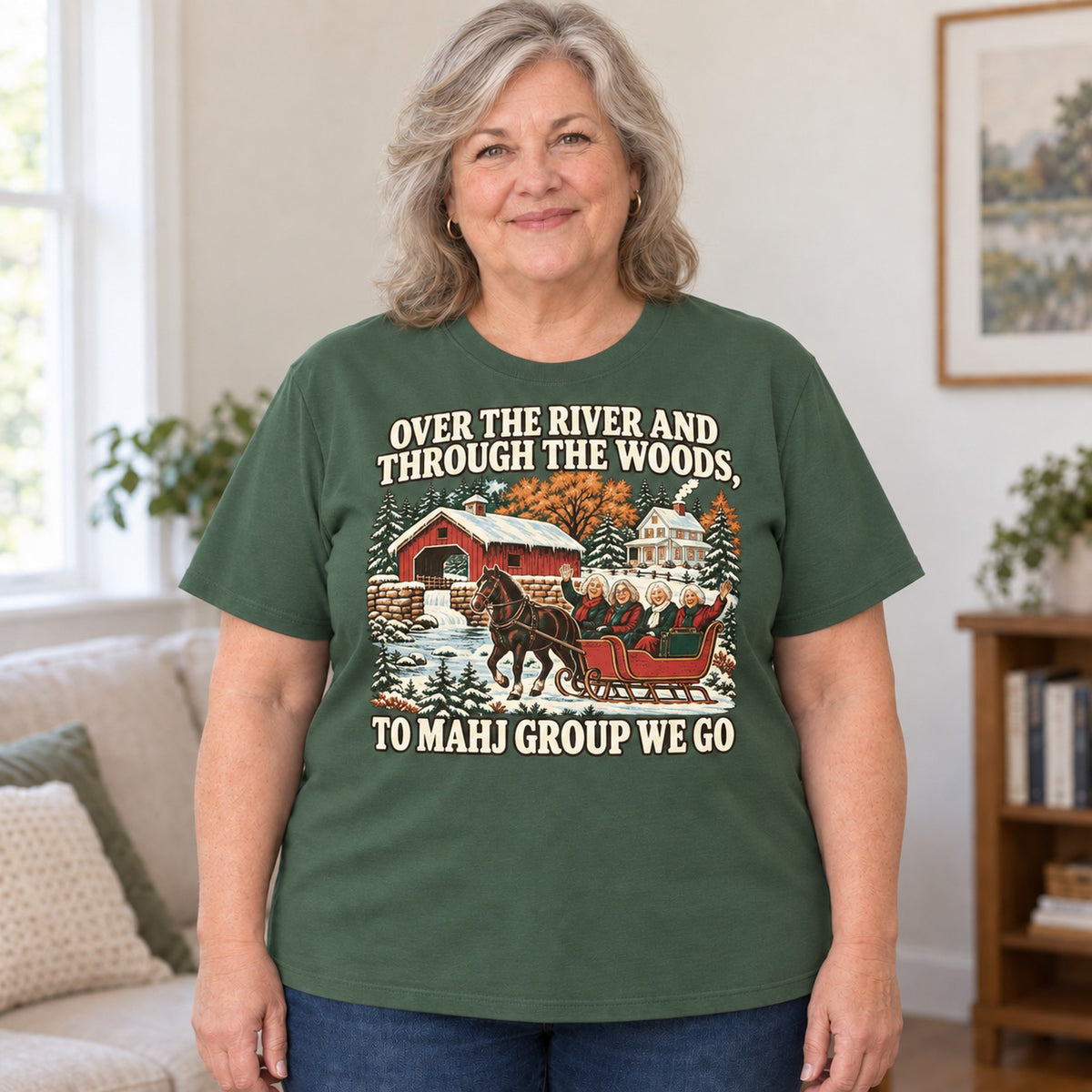 Over The River mahjong T-shirt in Military Green, worn by Debra. Debra is 5′4″ and wears her usual size 2XL. [bb c=military-green r=body2]