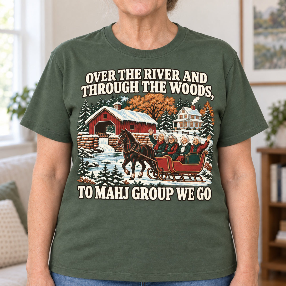 Over The River mahjong T-shirt in Military Green, close-up of the print, worn by Margaret. Margaret is 5′5″ and wears her usual size L. [bb c=military-green r=close]