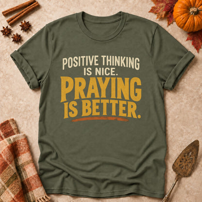 Praying Is Better faith T-shirt in Military Green, laid flat. [bb c=military-green r=flat]