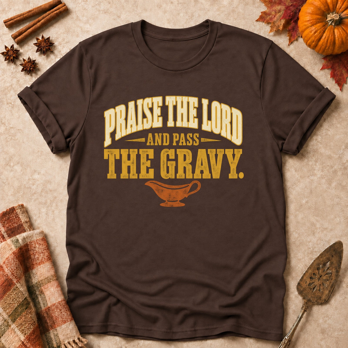 Praise The Lord And Pass The Gravy faith T-shirt in Dark Chocolate, laid flat. [bb c=dark-chocolate r=flat]