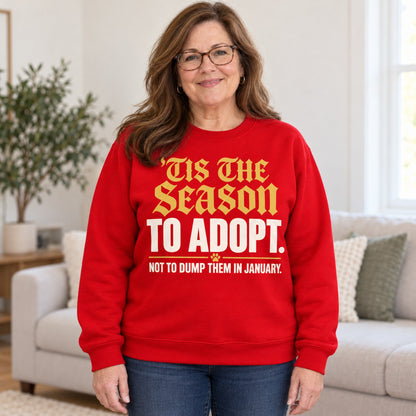 'Tis The Season To Adopt sweatshirt in Red, worn by Linda. Linda is 5′6″ and wears her usual size 2XL. [bb c=red r=body2]