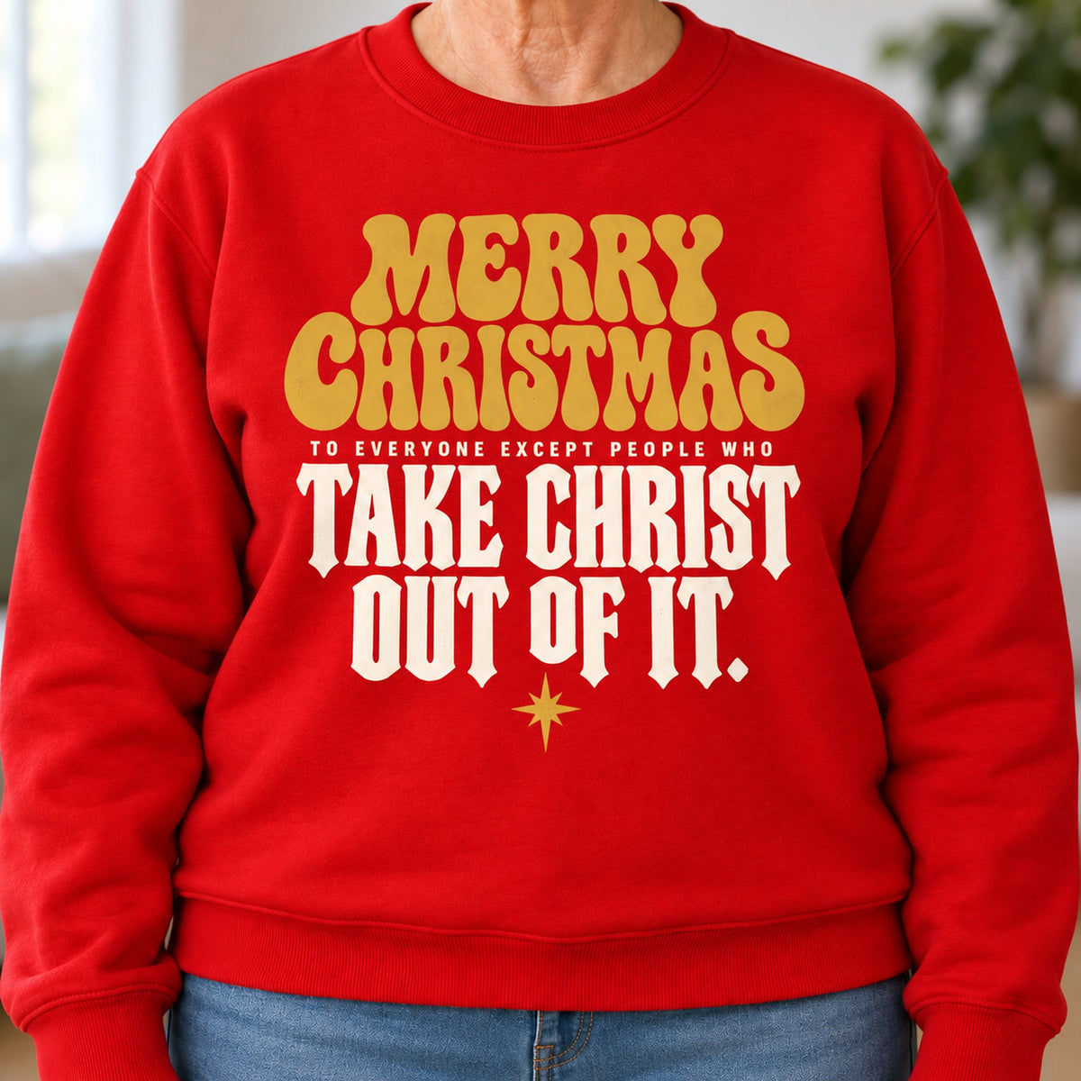 Merry Christmas Take Christ Out Of It sweatshirt in Red, close-up of the print, worn by Barbara. Barbara is 5′4″ and wears her usual size L. [bb c=red r=close]