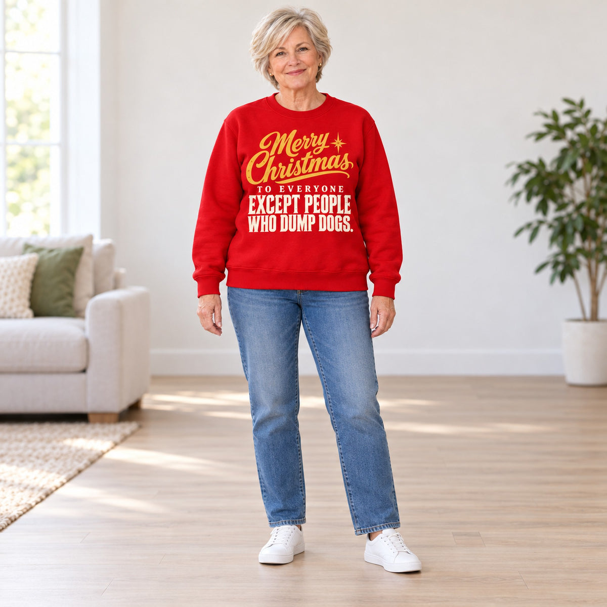 Merry Christmas Except People Who Dump Dogs sweatshirt in Red, full length, worn by Nancy. Nancy is 5′5″ and wears her usual size L. [bb c=red r=fit]