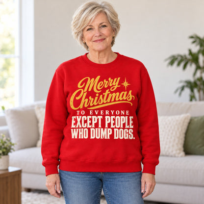 Merry Christmas Except People Who Dump Dogs sweatshirt in Red, worn by Nancy. Nancy is 5′5″ and wears her usual size L. [bb c=red r=hero]