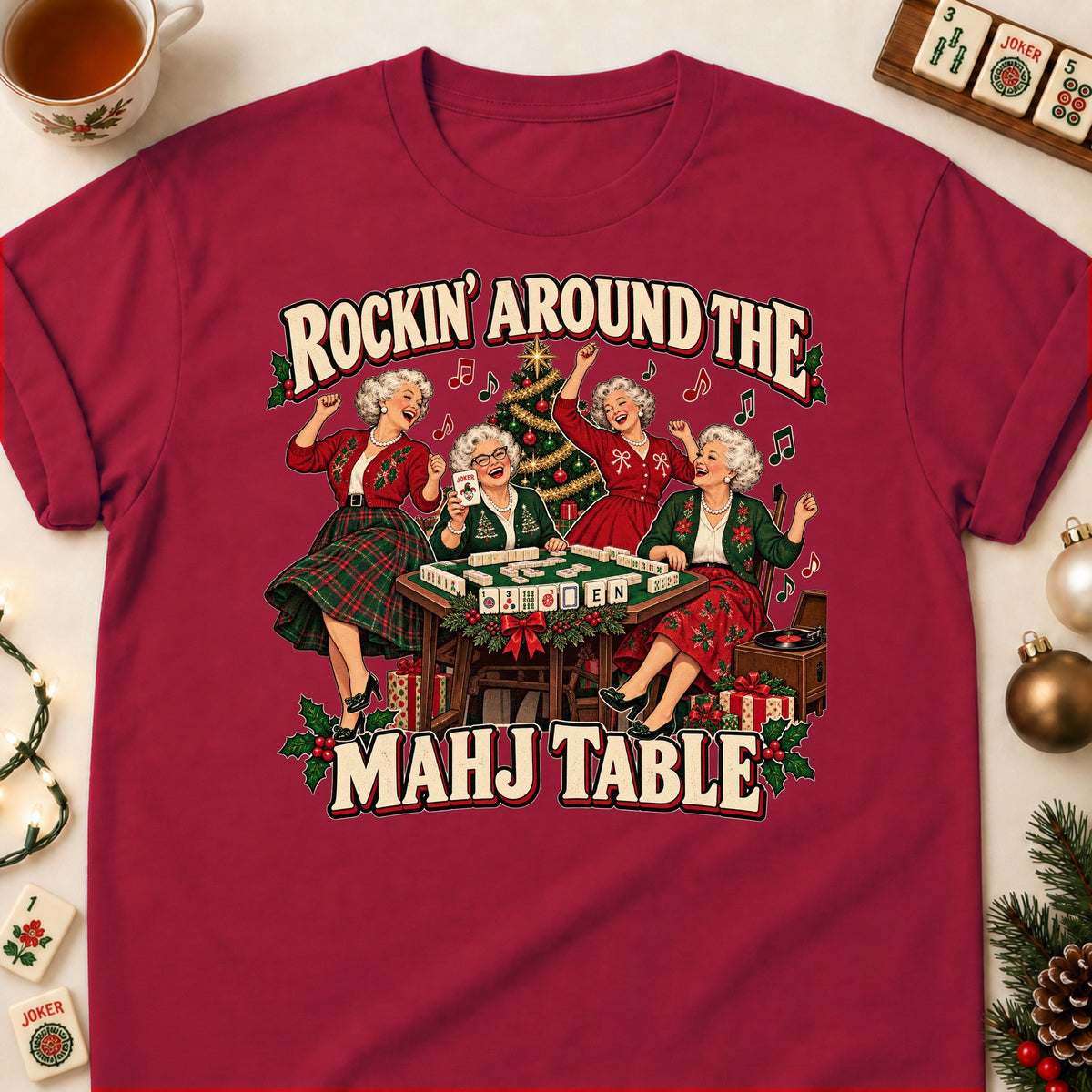 Rockin' Around The Mahj Table mahjong T-shirt in Cardinal Red, laid flat. [bb c=cardinal-red r=flat]