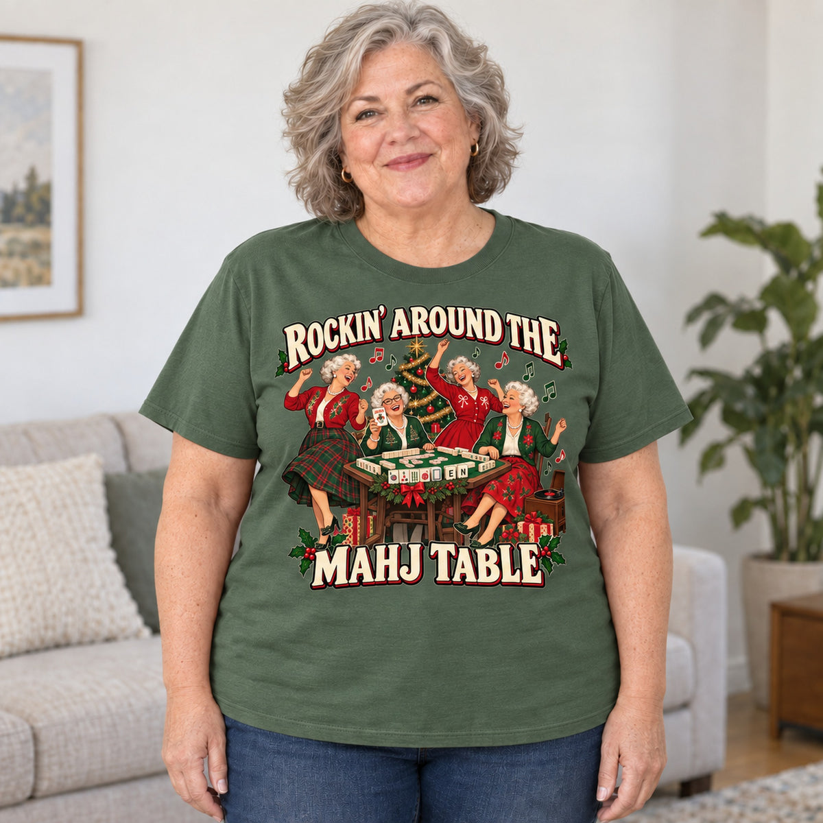 Rockin' Around The Mahj Table mahjong T-shirt in Military Green, worn by Debra. Debra is 5′4″ and wears her usual size 2XL. [bb c=military-green r=body2]