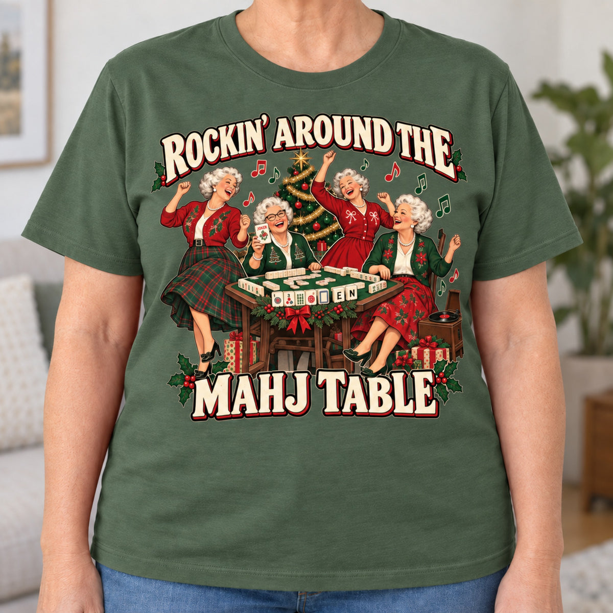 Rockin' Around The Mahj Table mahjong T-shirt in Military Green, close-up of the print, worn by Barbara. Barbara is 5′5″ and wears her usual size L. [bb c=military-green r=close]
