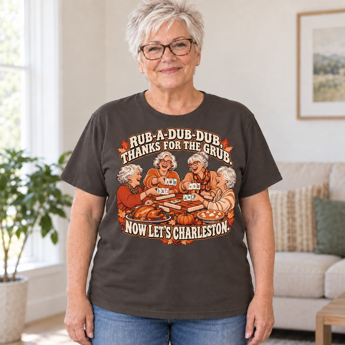 Rub-A-Dub-Dub mahjong T-shirt in Dark Chocolate, worn by Brenda. Brenda is 5′5″ and wears her usual size L. [bb c=dark-chocolate r=hero]