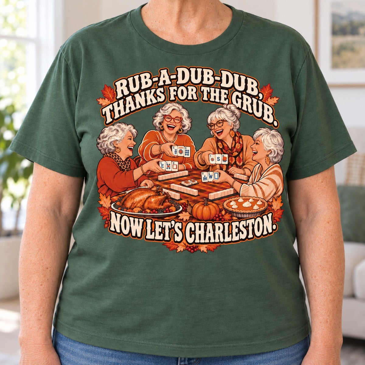 Rub-A-Dub-Dub mahjong T-shirt in Military Green, close-up of the print, worn by Brenda. Brenda is 5′5″ and wears her usual size L. [bb c=military-green r=close]
