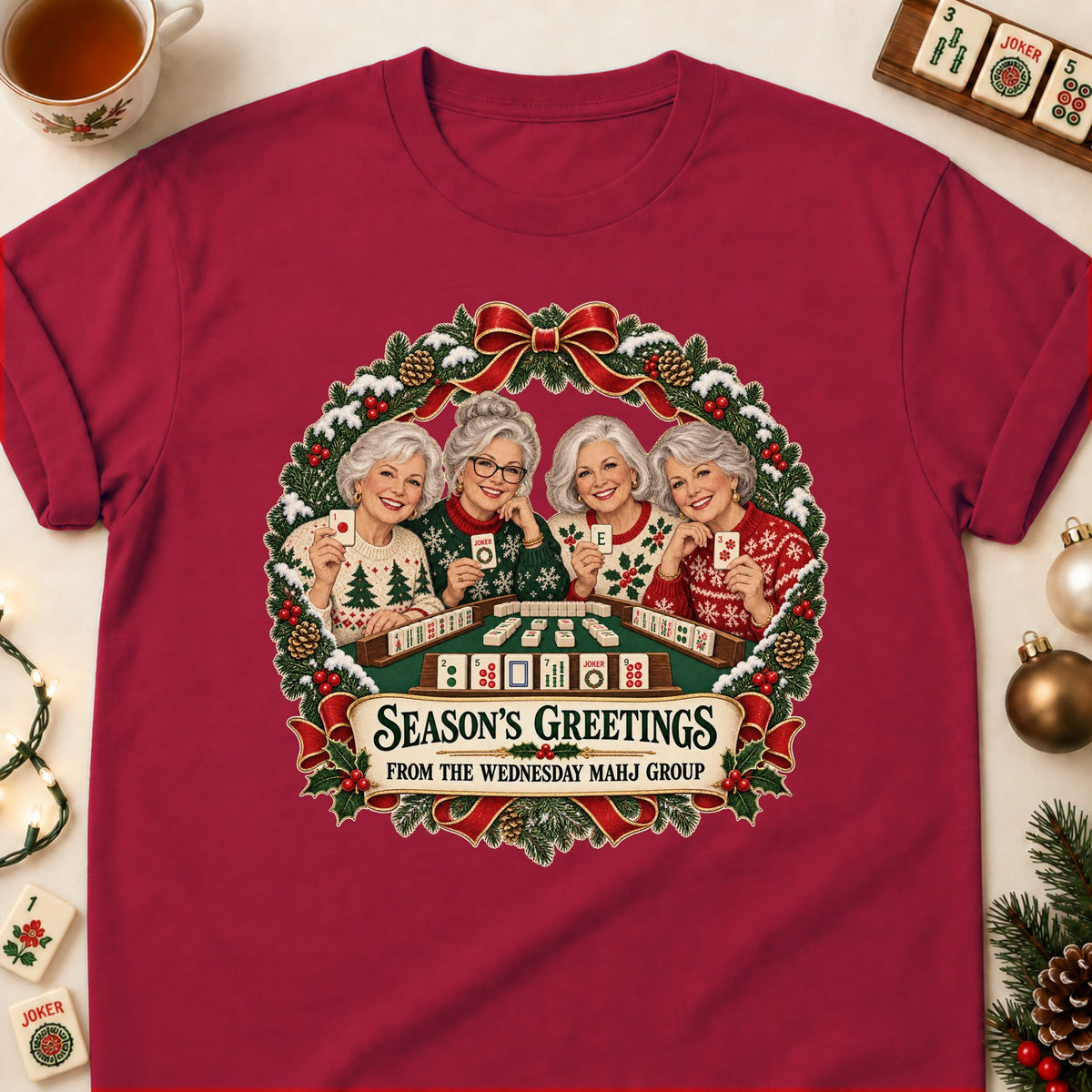 Season's Greetings mahjong T-shirt in Cardinal Red, laid flat. [bb c=cardinal-red r=flat]