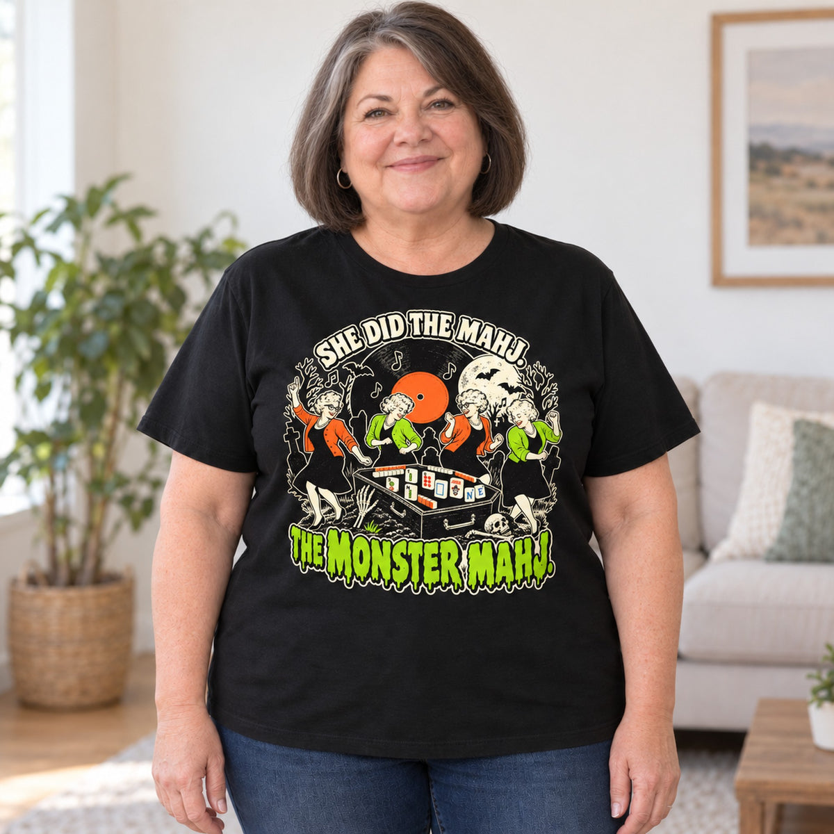 Monster Mahj mahjong T-shirt in Black, worn by Debra. Debra is 5′4″ and wears her usual size 2XL. [bb c=black r=body2]