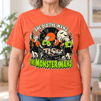 Monster Mahj mahjong T-shirt in Orange, close-up of the print, worn by Janet. Janet is 5′5″ and wears her usual size L. [bb c=orange r=close]