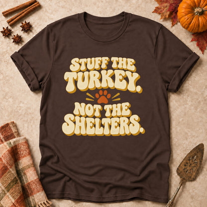 Stuff The Turkey, Not The Shelters dog mom T-shirt in Dark Chocolate, laid flat. [bb c=dark-chocolate r=flat]