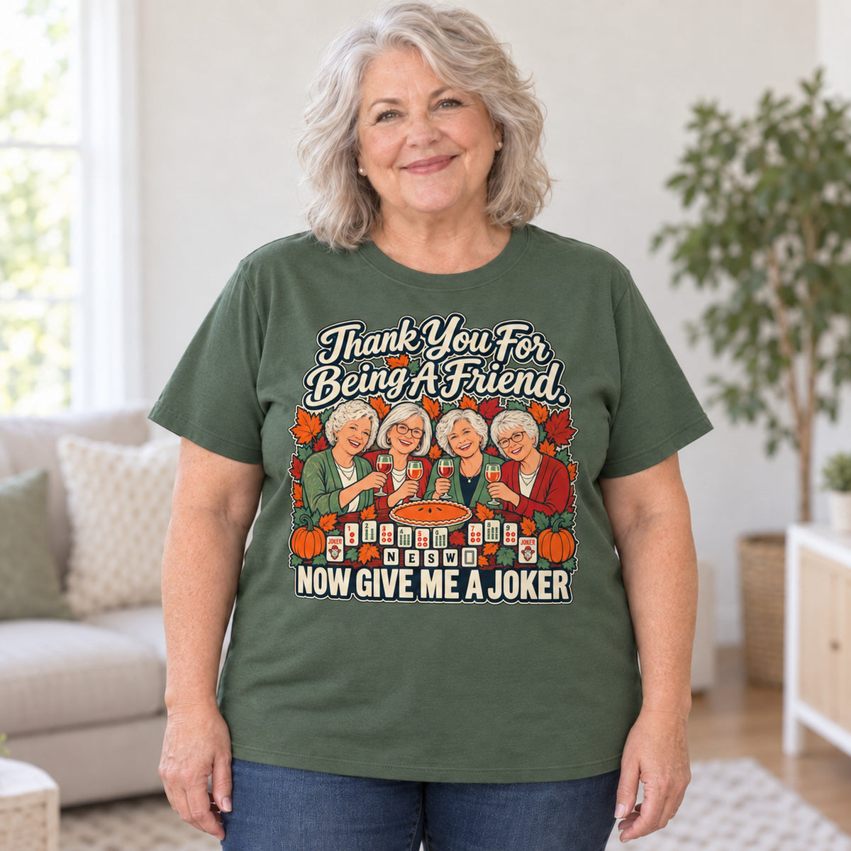 Thank You For Being A Friend mahjong T-shirt in Military Green, worn by Debra. Debra is 5′4″ and wears her usual size 2XL. [bb c=military-green r=body2]