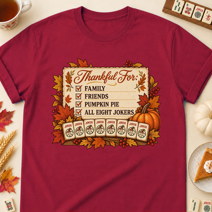 Thankful For mahjong T-shirt in Cardinal Red, laid flat. [bb c=cardinal-red r=flat]