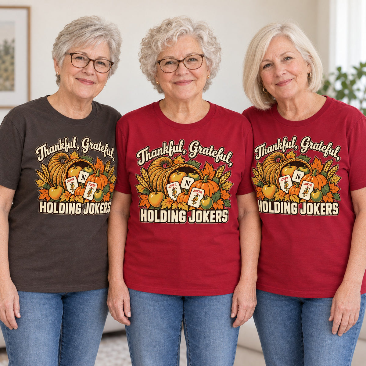 Thankful, Grateful, Holding Jokers mahjong T-shirt worn by three friends. Friends are wearing M, L and XL. [bb c=all r=friends]