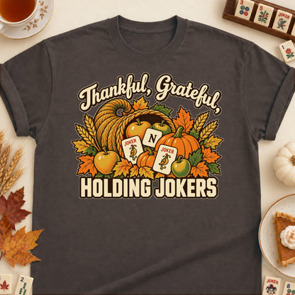 Thankful, Grateful, Holding Jokers mahjong T-shirt in Dark Chocolate, laid flat. [bb c=dark-chocolate r=flat]
