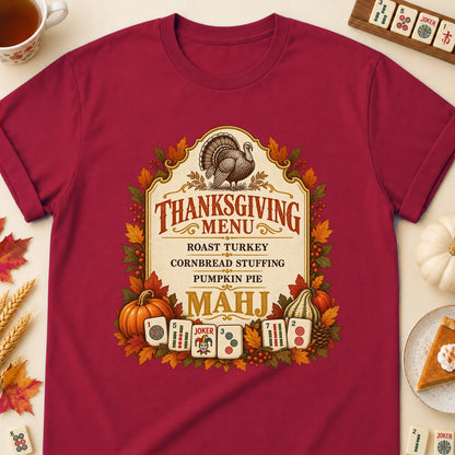 Thanksgiving Menu mahjong T-shirt in Cardinal Red, laid flat. [bb c=cardinal-red r=flat]