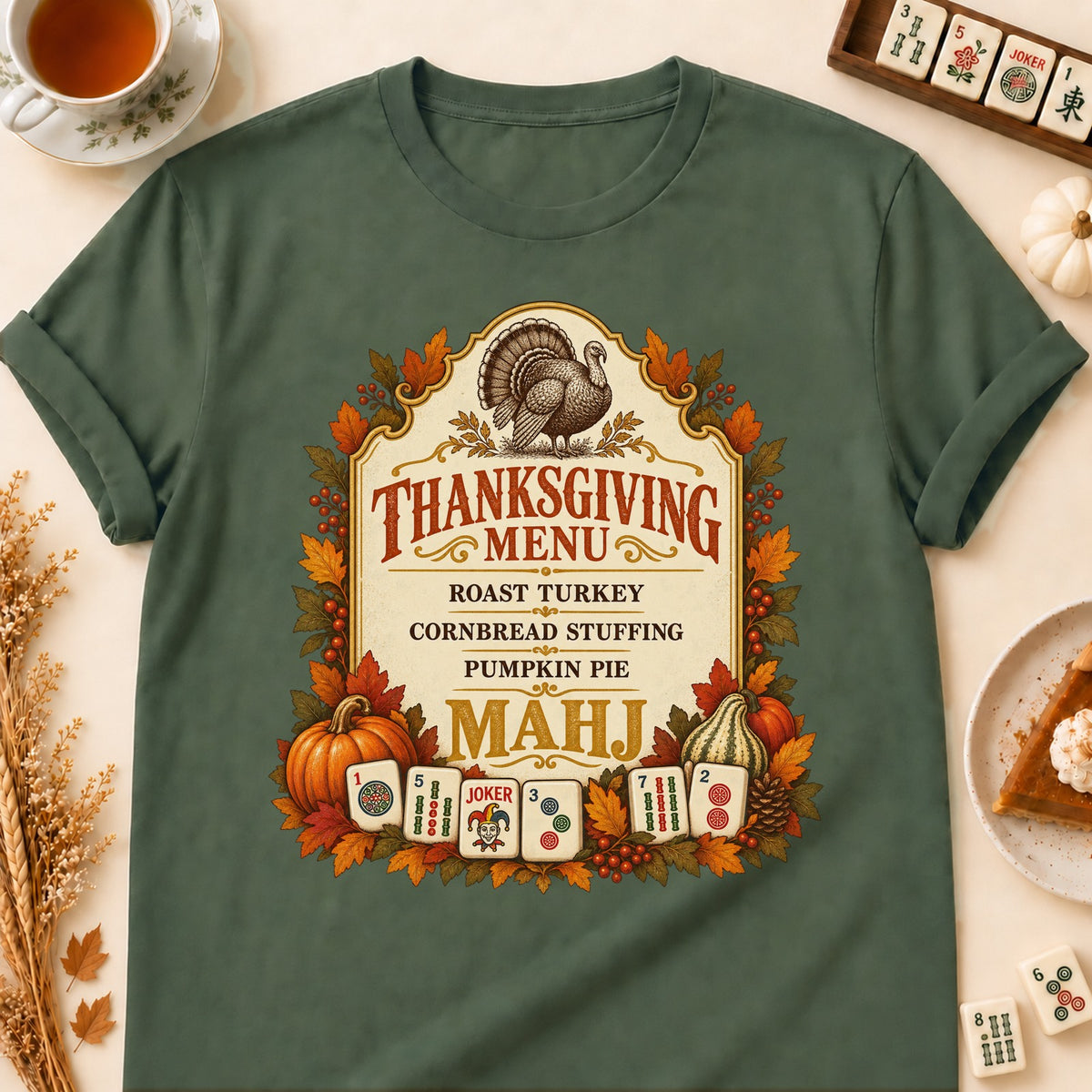 Thanksgiving Menu mahjong T-shirt in Military Green, laid flat. [bb c=military-green r=flat]