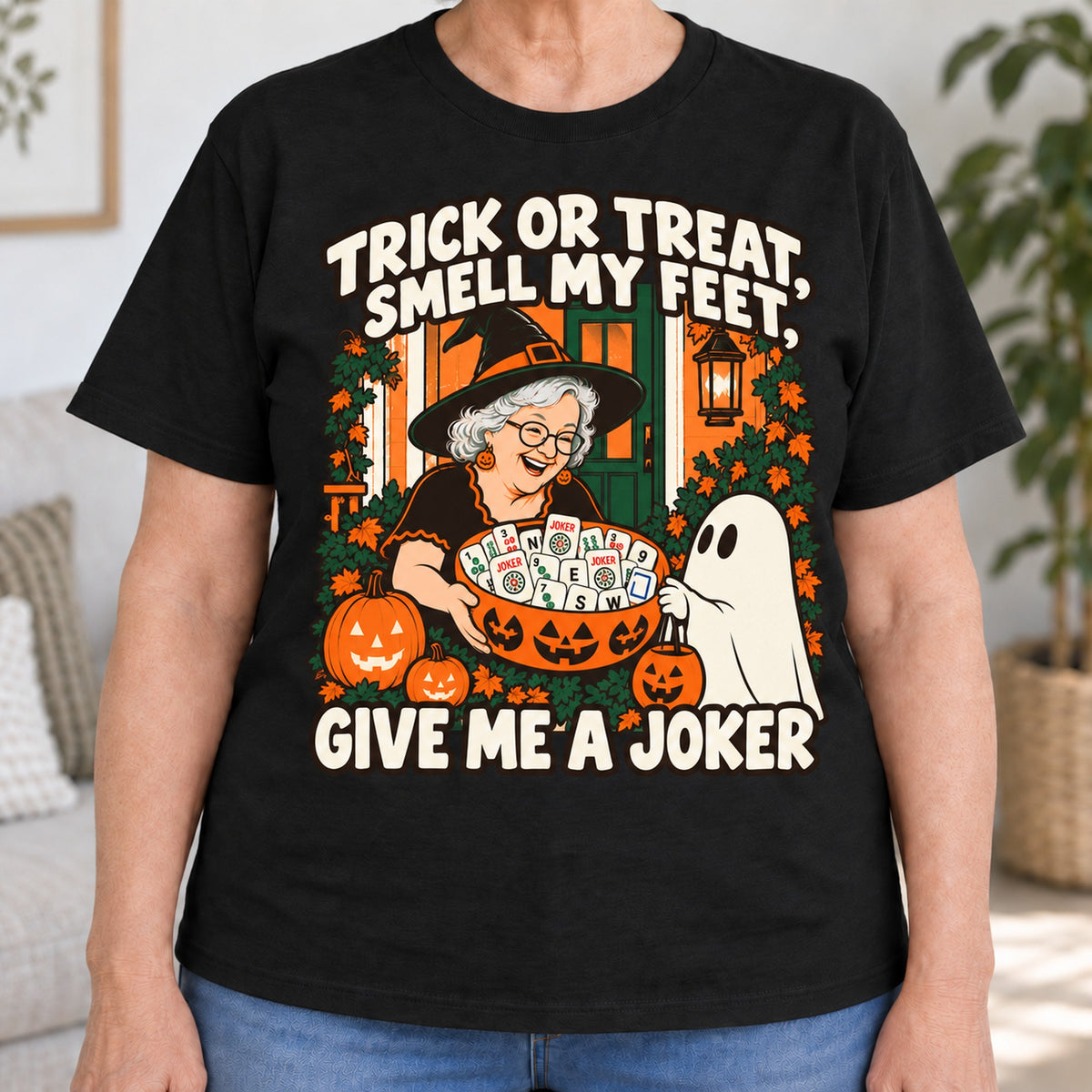 Trick Or Treat mahjong T-shirt in Black, close-up of the print, worn by Peggy. Peggy is 5′5″ and wears her usual size L. [bb c=black r=close]