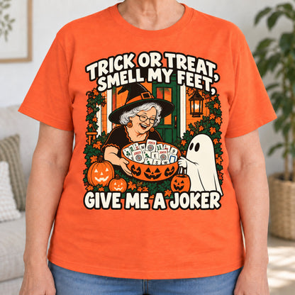 Trick Or Treat mahjong T-shirt in Orange, close-up of the print, worn by Peggy. Peggy is 5′5″ and wears her usual size L. [bb c=orange r=close]