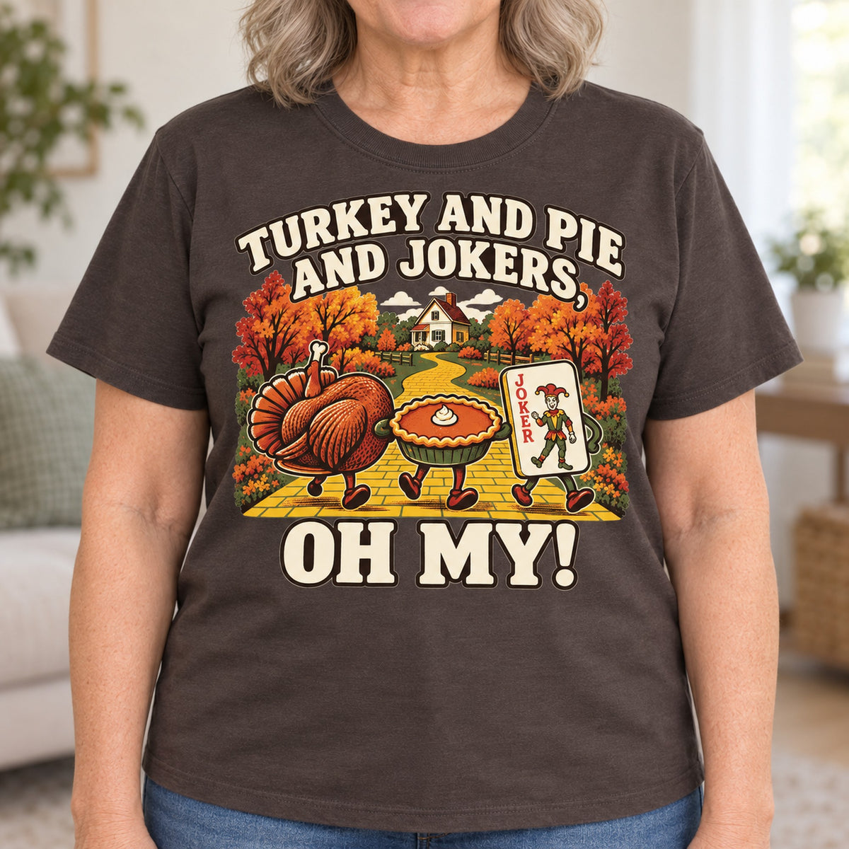 Turkey And Pie And Jokers mahjong T-shirt in Dark Chocolate, close-up of the print, worn by Shirley. Shirley is 5′5″ and wears her usual size L. [bb c=dark-chocolate r=close]