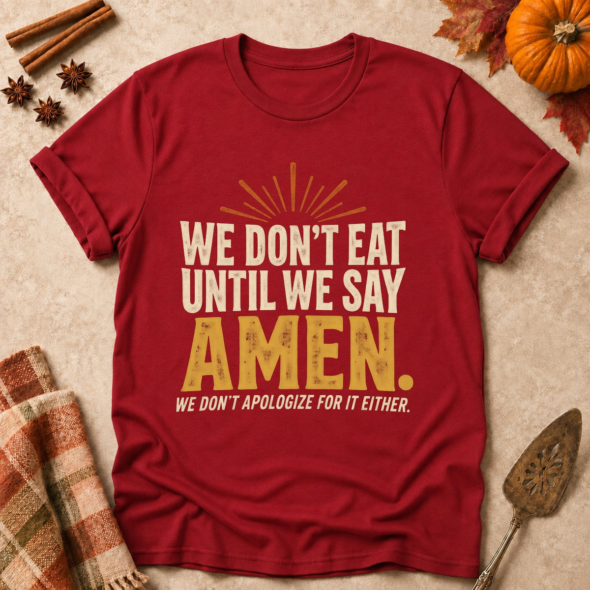 Until We Say Amen faith T-shirt in Cardinal Red, laid flat. [bb c=cardinal-red r=flat]