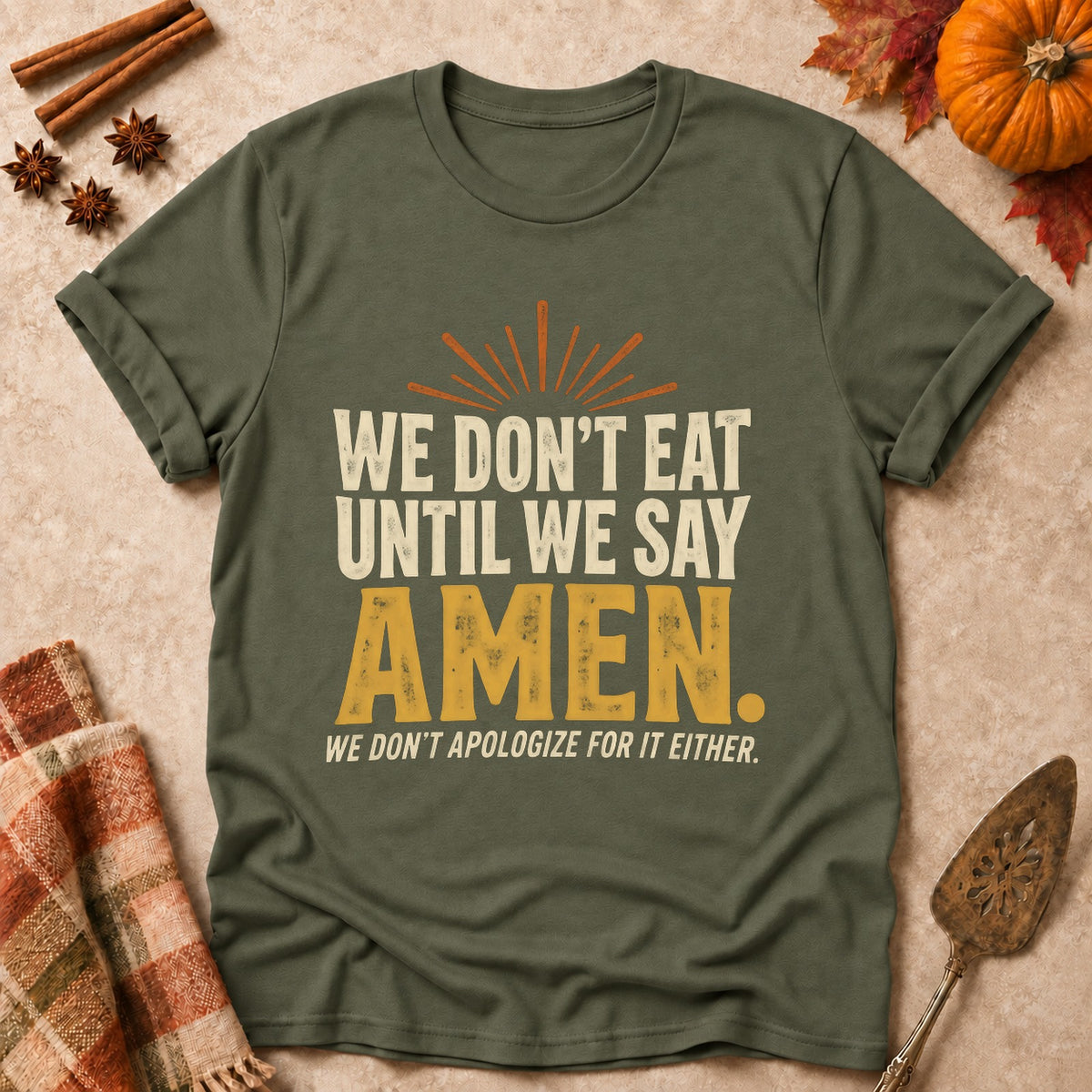 Until We Say Amen faith T-shirt in Military Green, laid flat. [bb c=military-green r=flat]