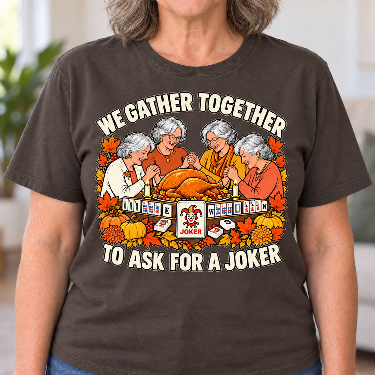 We Gather Together mahjong T-shirt in Dark Chocolate, close-up of the print, worn by Patricia. Patricia is 5′5″ and wears her usual size L. [bb c=dark-chocolate r=close]