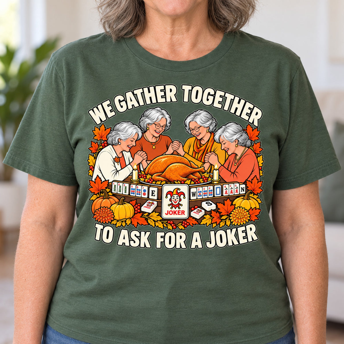 We Gather Together mahjong T-shirt in Military Green, close-up of the print, worn by Patricia. Patricia is 5′5″ and wears her usual size L. [bb c=military-green r=close]