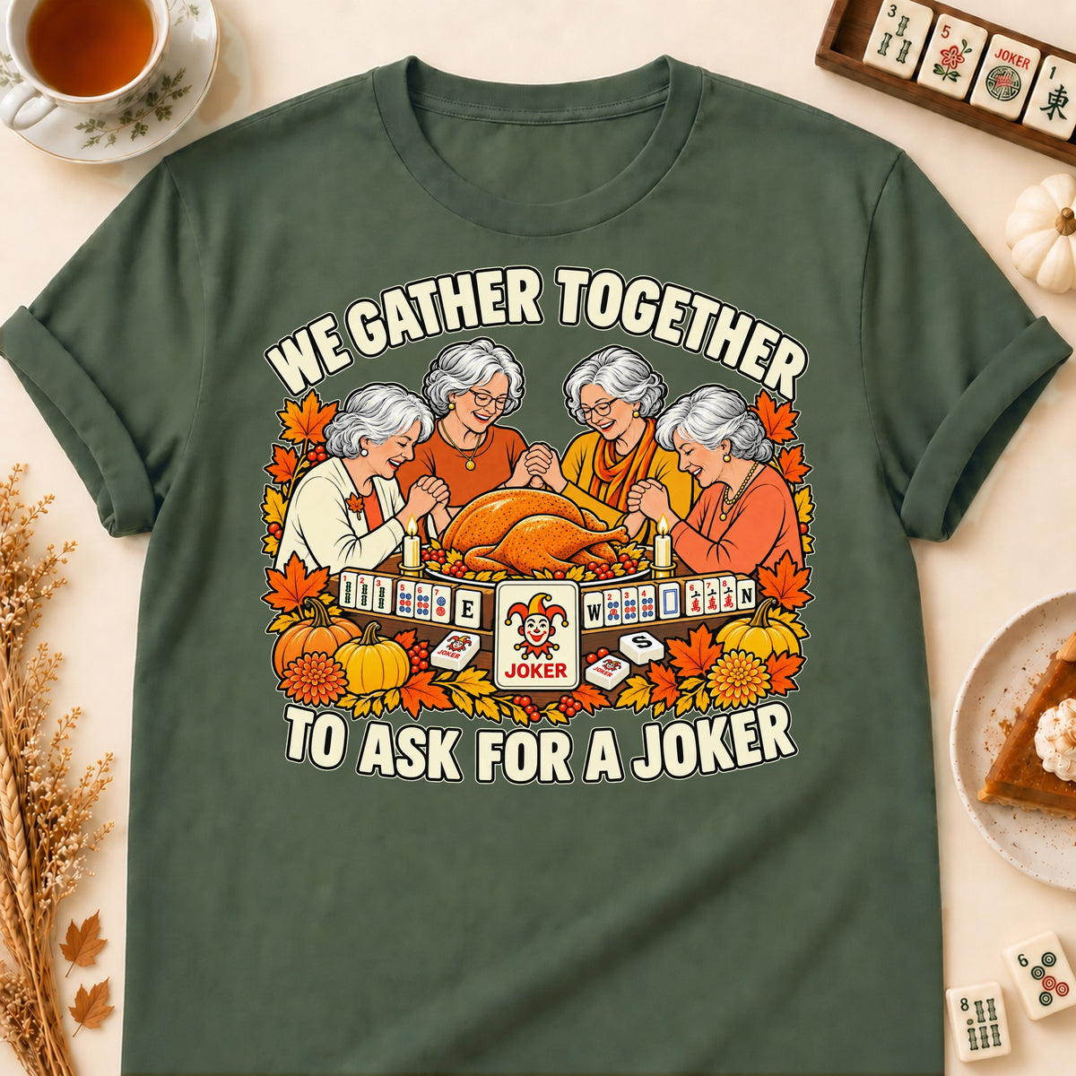We Gather Together mahjong T-shirt in Military Green, laid flat. [bb c=military-green r=flat]