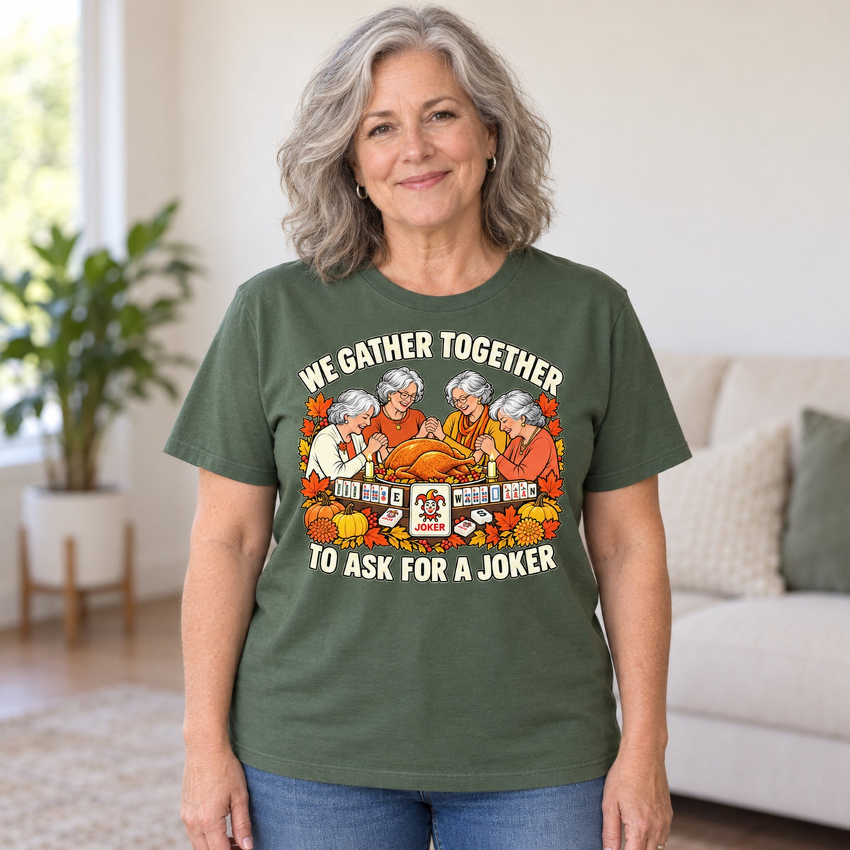 We Gather Together mahjong T-shirt in Military Green, worn by Patricia. Patricia is 5′5″ and wears her usual size L. [bb c=military-green r=hero]