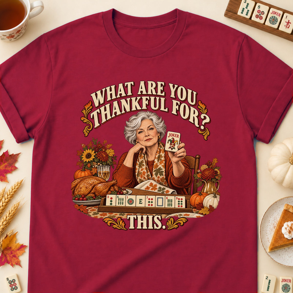 What Are You Thankful For mahjong T-shirt in Cardinal Red, laid flat. [bb c=cardinal-red r=flat]
